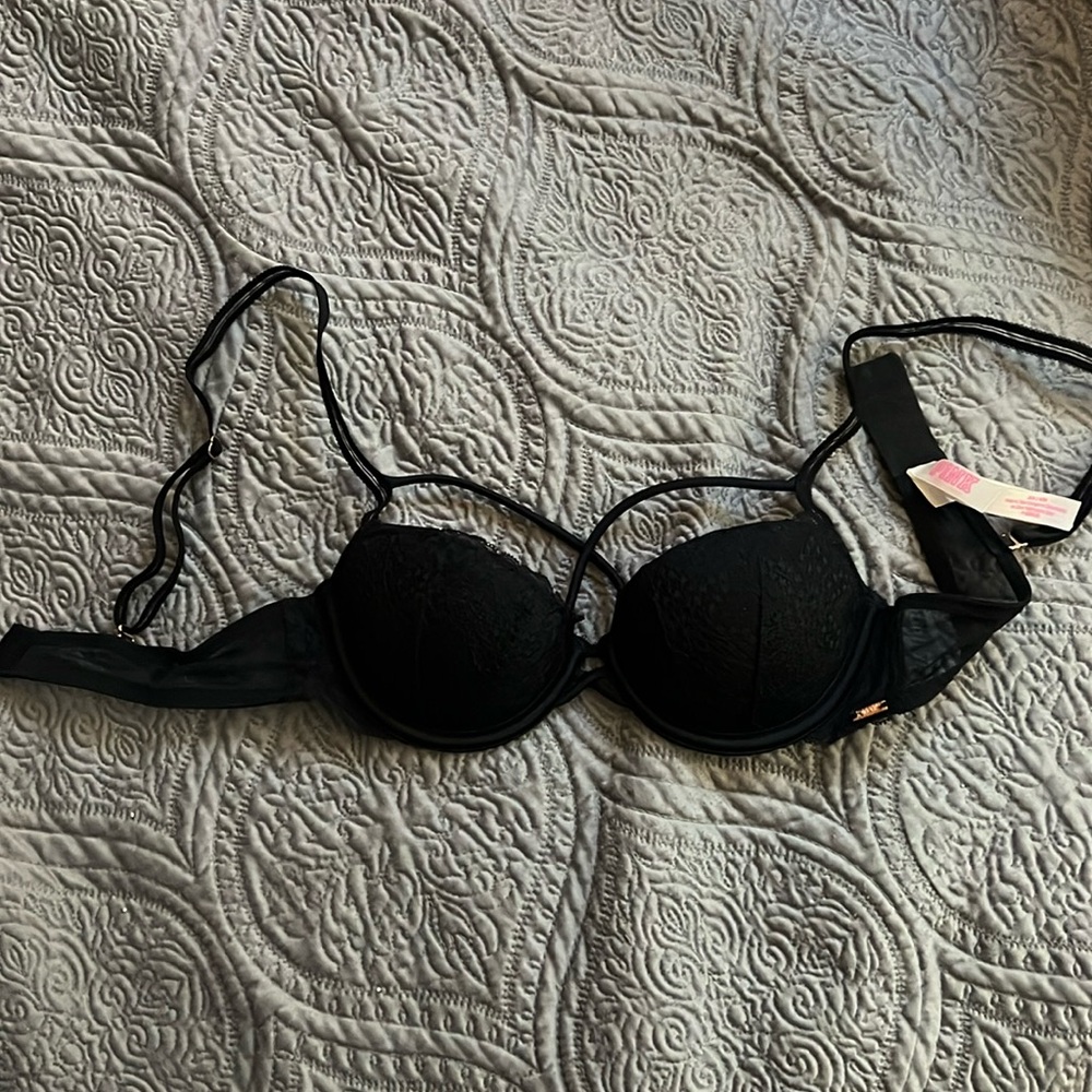 Victoria’s Secret pink criss cross bra